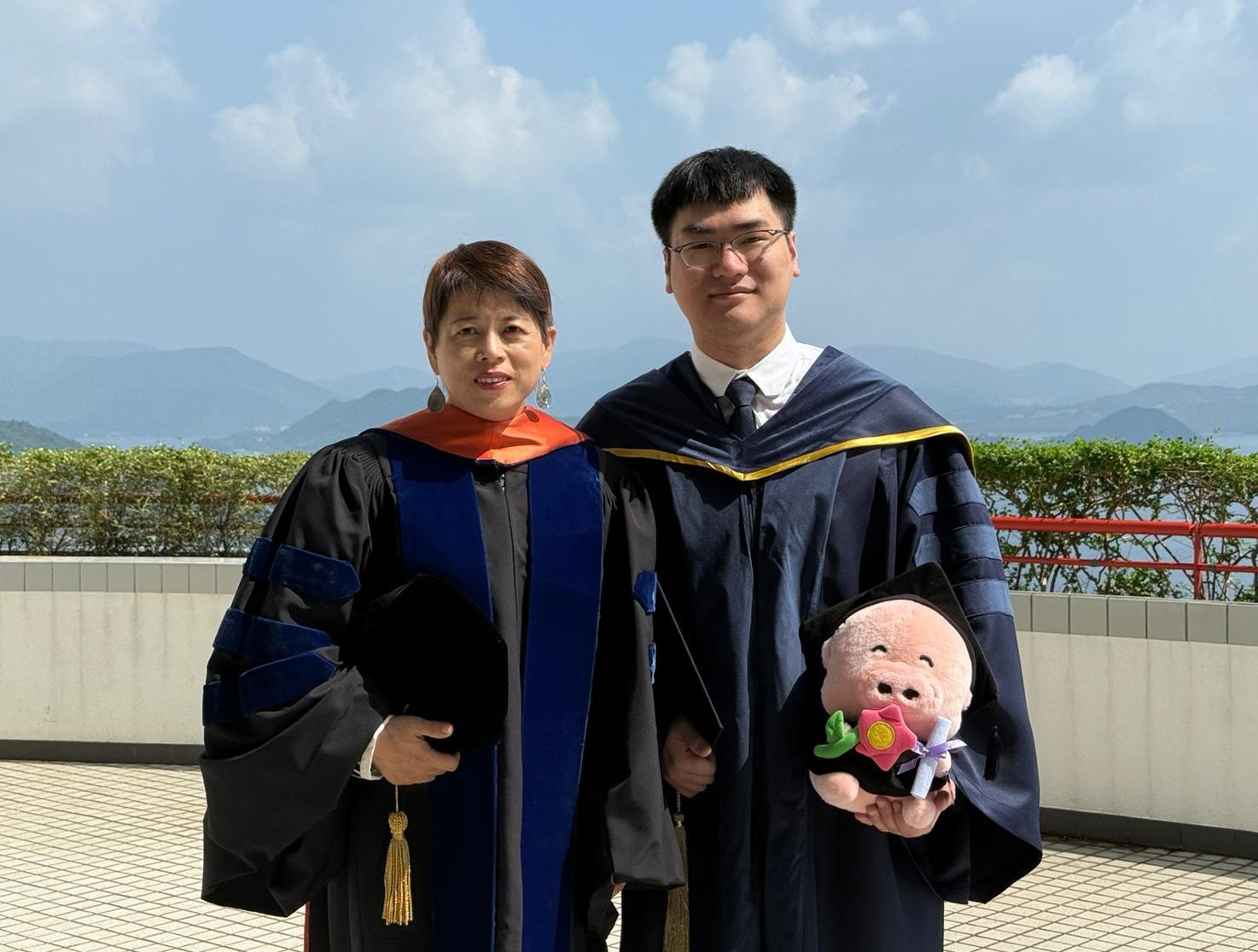 William Lung and Prof. Irene Lo on William's graduation day